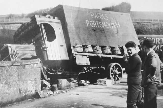 Chaos at a bridge somewhere. The Parks of Southsea lorry after a bridge crash.