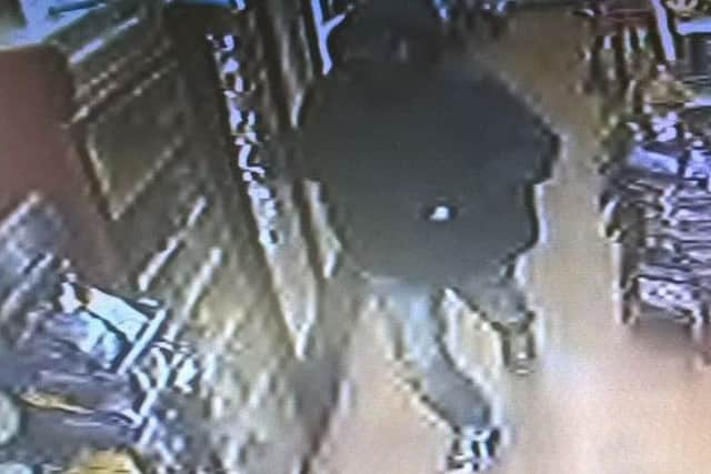 CCTV of man police want to locate.