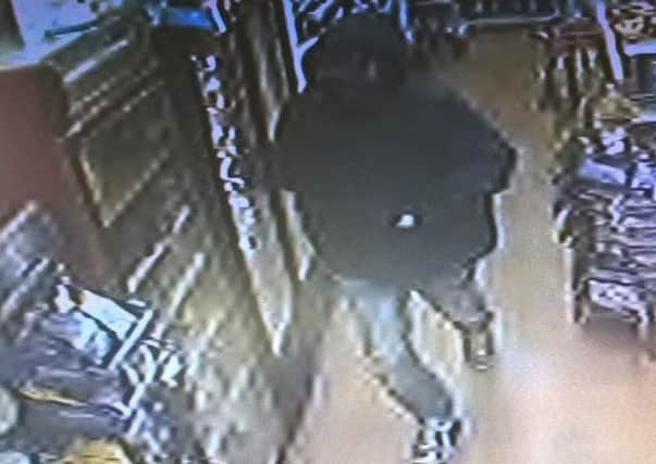 CCTV of man police want to locate.