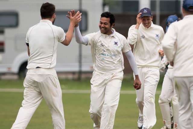 Vikram Dawson celebrates a wicket. Picture: Keith Woodland