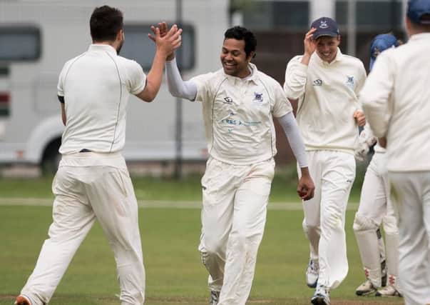 Vikram Dawson celebrates a wicket. Picture: Keith Woodland