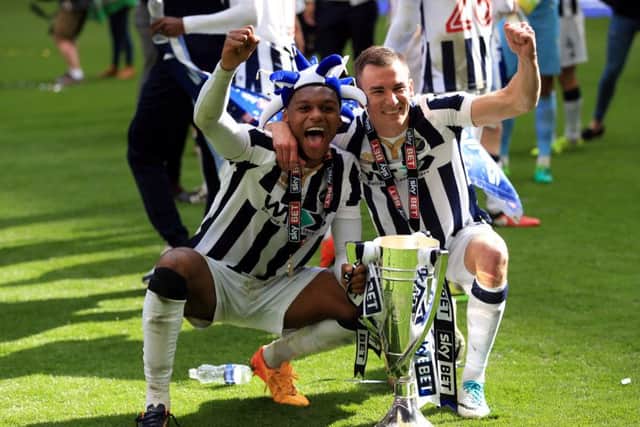 Millwall's (left-right) Mahlon Romeo and Jed Wallace celebrate winning at Wembley