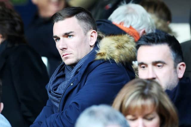 Jed Wallace watching Pompey last season. Picture: Joe Pepler