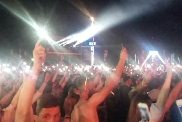 15,000 fans at Mutiny festival hold phones and lighters aloft in a gesture of solidarity with the city of Manchester