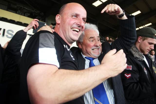 TITLE-WINNER Paul Cook, left, with chairman Iain McInnes Picture: Joe Pepler