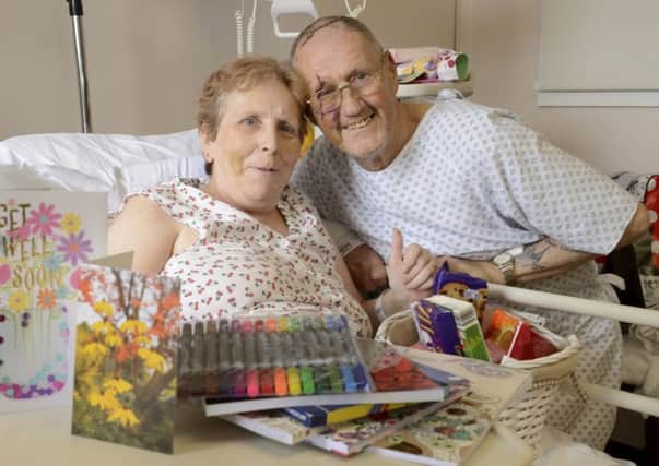 Lynne and Trevor Stallard from Gosport, have been overwhelmed by local visitors,gifts and cards after their car crash in Scotland.


Picture: Gary Anthony / Scottish Provincial Press