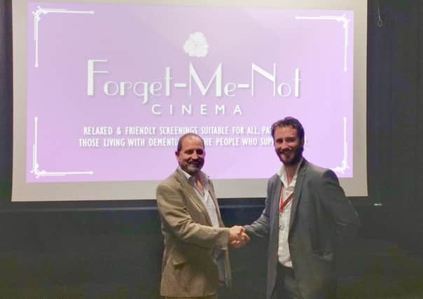 Mark Gettinby, director of Home Instead Senior Care in Havant and Jon Woodley, interim director of The Spring Arts and Heritage Centre, which will be holding dementia-friendly film showings