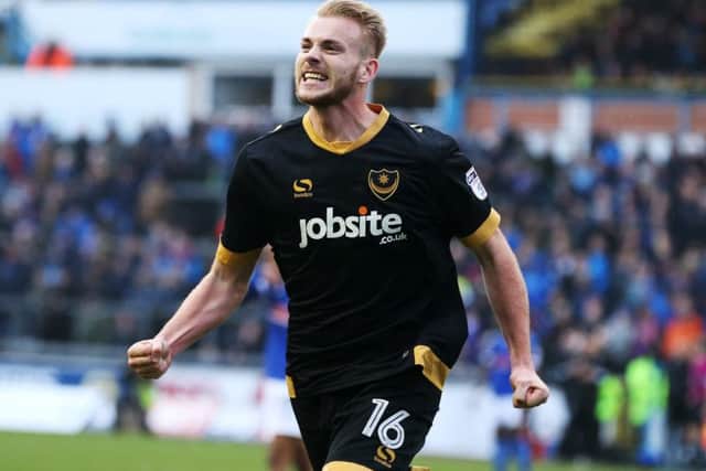 Jack Whatmough celebrates his goal against Carlisle. Picture: Joe Pepler