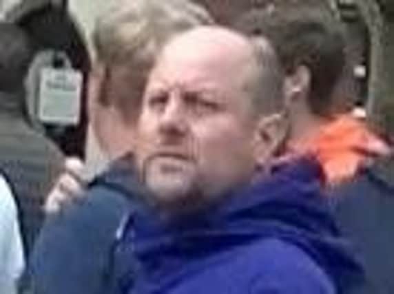 Police want to speak to this man after football-related violence in Portsmouth