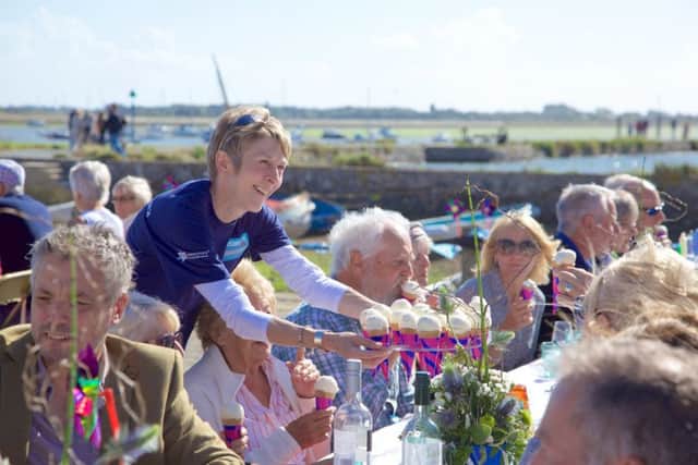 Guests tuck into locally-made ice cream at last years dinner on the quay at Emsworth British Food Fortnight