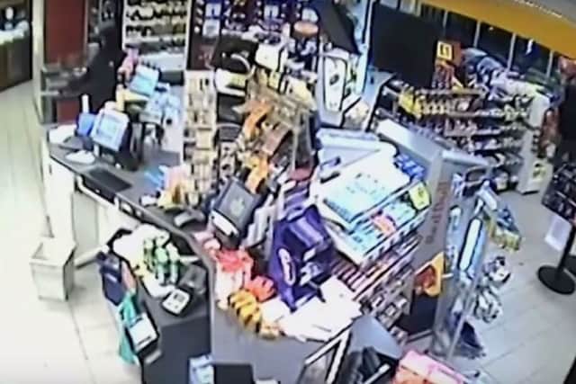 The men entering the store. Picture: Sussex Police
