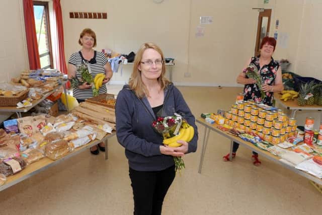 Sue Cooper (middle) with (left) Sarah Roberts and Janet Houlden, volunteers. Picture: Sarah Standing (170664-2522)