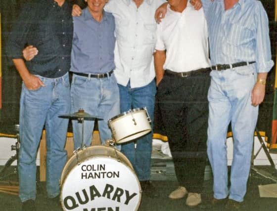 Rod Davis (originally banjo), Colin Hanton (drums), Len Garry (originally tea-chest bass), Eric Griffiths (guitar), Pete Shotton (washboard). These were the five who were on stage with John Lennon on July 6, 1957, the day he met Paul McCartney