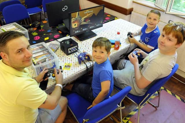 From left: Mark Clarke (39) with Liam Stuart (5), Harry Clarke (8) and Connor Norval (13) at the St Games Day
Picture by: Malcolm Wells (170601-5535