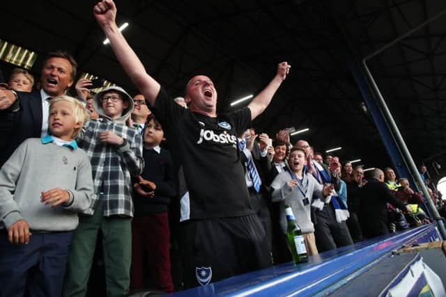 Paul Cook celebrates the League Two title with Pompey. Picture: Joe Pepler