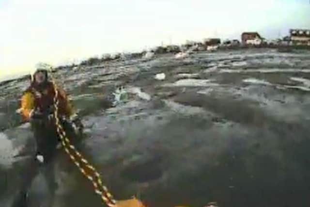 A screenshot from the RNLI mudflats rescue video