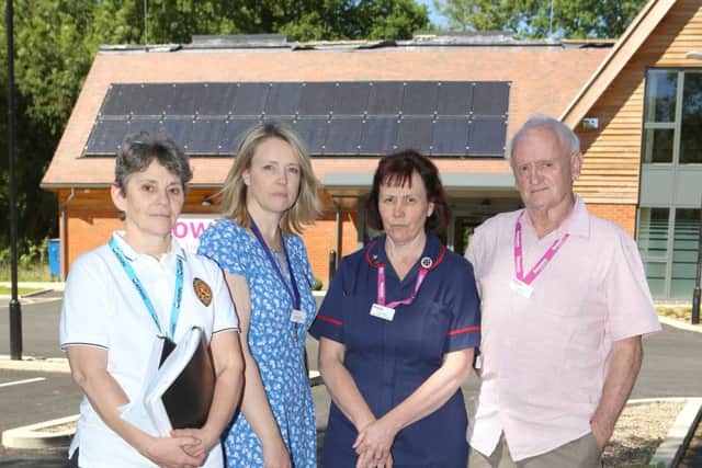 Staff Maggi Hardcastle, Amanda Mahoney, Tracey Jeffery and Doug Bowen outside the Living Well Centre