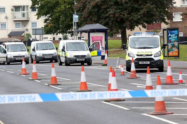 Police at the scene of the stabbing in Lake Road, Southsea