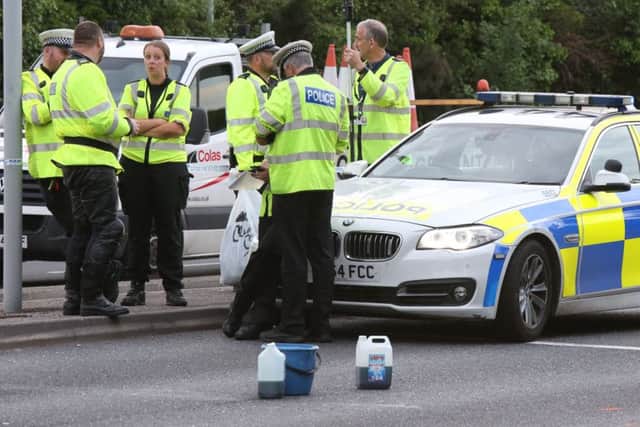 Police at the scene of the fatal accident on the Eastern Road on Friday evening.
Picture: Jason Kay