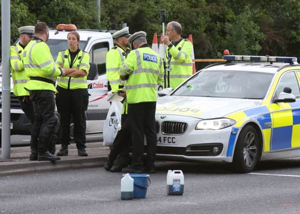 Police at the scene of the fatal accident on the Eastern Road on Friday evening.
Picture: Jason Kay