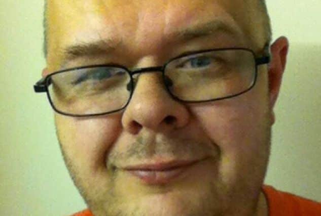 Tim Atkins was described as a 'devoted father' by his family