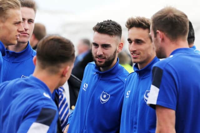 Ben Close, centre, with some of his Blues team-mates at the reception on Southsea Common to mark Pompeys League Two title success