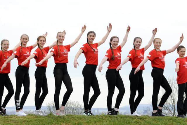 Dancers from the Timestep Dance Academy. Far right, Louis Williamson