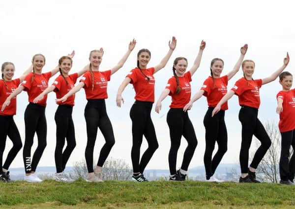 Dancers from the Timestep Dance Academy. Far right, Louis Williamson