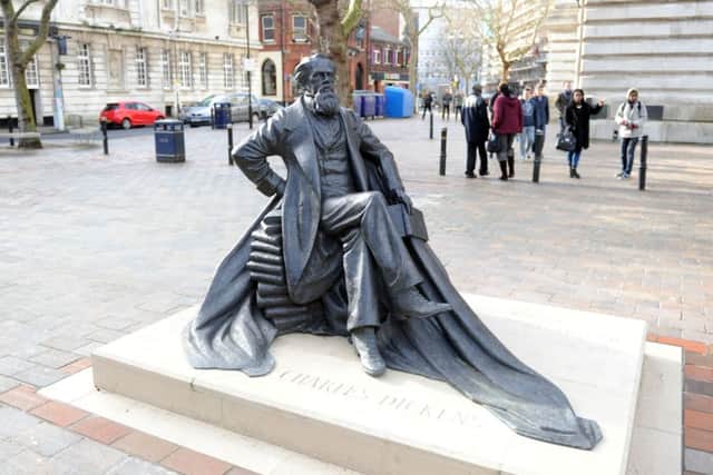 The statue of Charles Dickens in Guildhall Square, Portsmouth