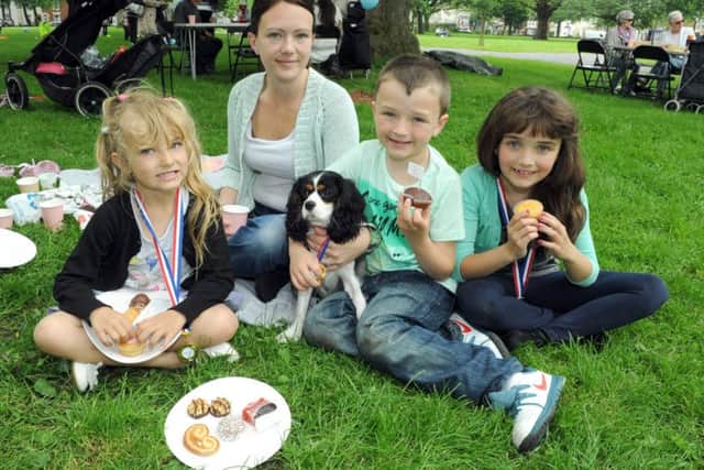 Jean Lambert, 28, with her children Alanna Day, 6, Jamie Molloy, 8, and Alicia Molloy, 9 and dog Bella at The Big Lunch  Picture: Paul Jacobs (141672-5)