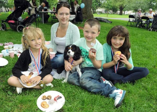 Jean Lambert, 28, with her children Alanna Day, 6, Jamie Molloy, 8, and Alicia Molloy, 9 and dog Bella at The Big Lunch  Picture: Paul Jacobs (141672-5)