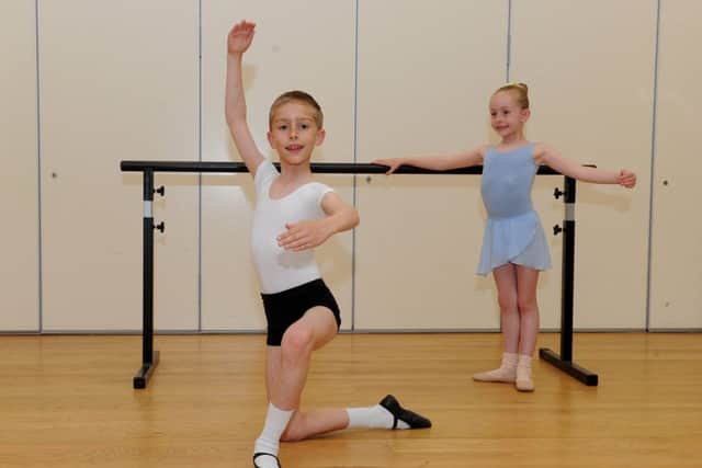 Callum Finch (nine) from  Southsea, during rehearsals with his proud sister Chloe (six) 

Picture: Sarah Standing (170725-2990)