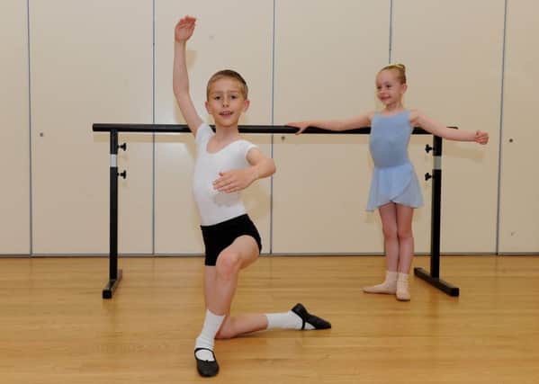 Callum Finch (nine) from  Southsea, during rehearsals with his proud sister Chloe (six) 

Picture: Sarah Standing (170725-2990)