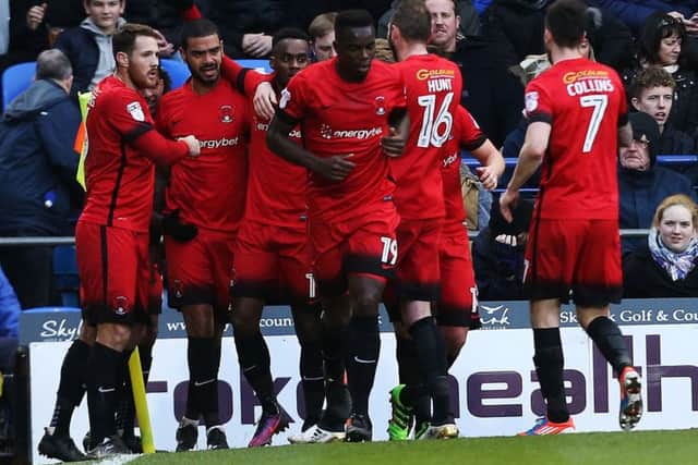 Gavin Massey, centre, celebrates scoring against Pompey for Leyton Orient in January