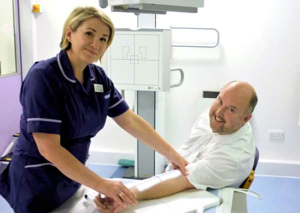 Pictured is MIU manager Paul Hayllar and senior radiographer Nicole O'Connor. 
Picture: Care UK/St Mary's Treatment Centre