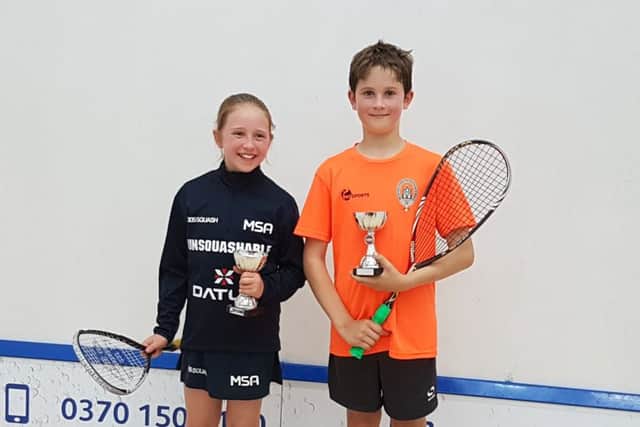 Alexander Broadbridge, right and Charlie McCrone, left celebrate their wins in the English squad under-11s championships