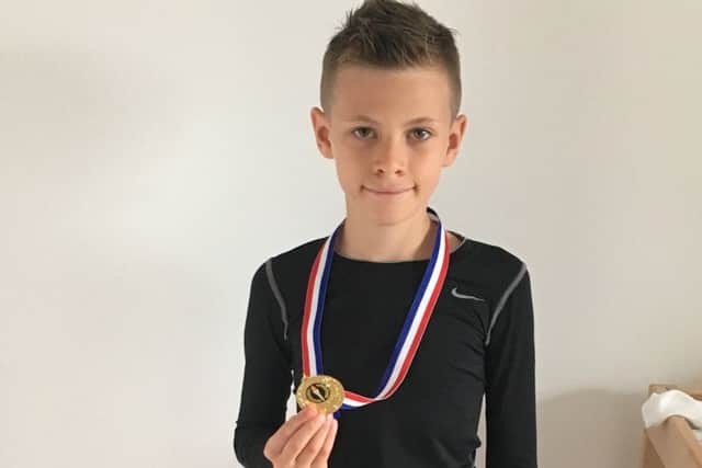 Jake Gifford with his under-10s British title medal PPP-170806-165713001