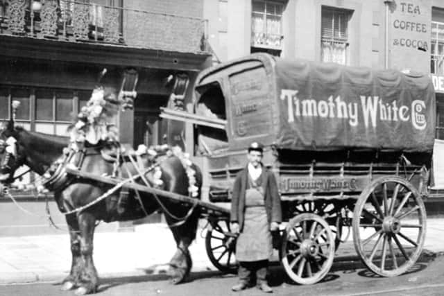 Timothy Whites delivery van, possibly in Broad Street, Old Portsmouth, before 1935.