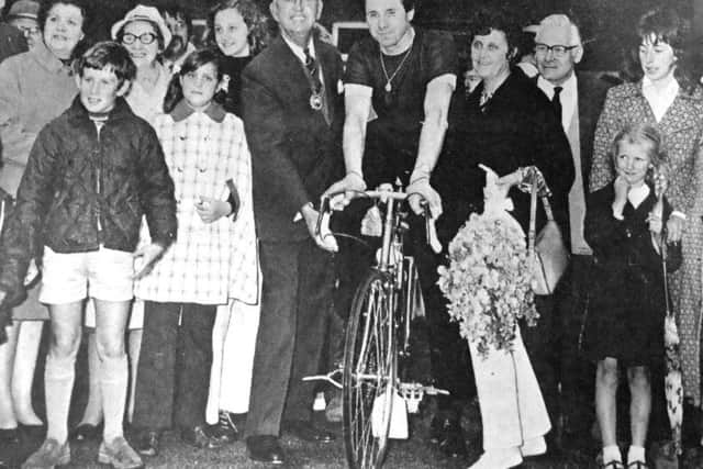 Ray is pictured on his bike alongside deputy mayor of Gosport, V Neal, as he prepares to embark on the journey of a lifetime