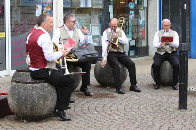 The Maritime Brass Ensemble playing in the town square.