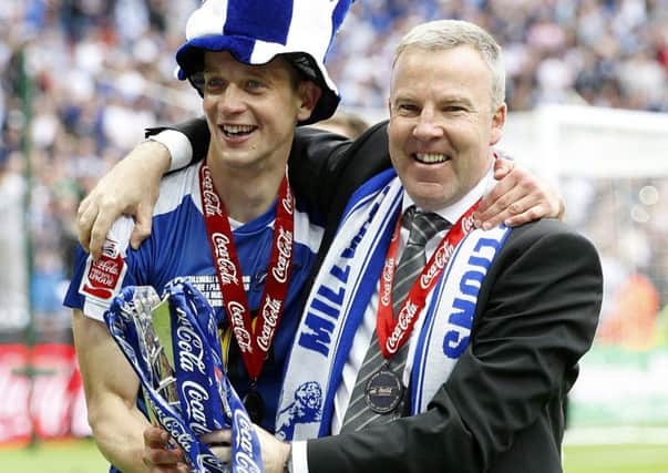 Kenny Jackett and Paul Robinson celebrate promotion with Millwall in 2009-10
