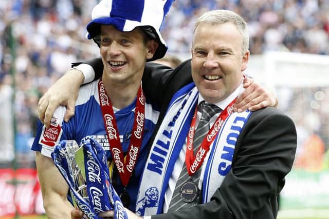 Kenny Jackett and Paul Robinson celebrate promotion with Millwall in 2009-10