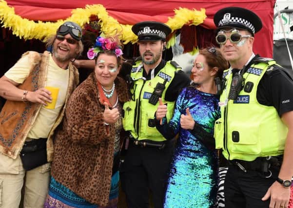 Police with revellers at the Isle of Wight Festival 2017. Picture: @FestivalCop