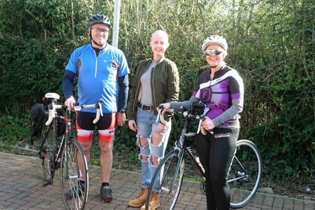 Bethany Tiller with Mick and Angela Upson who are doing a cycle ride to raise money for her