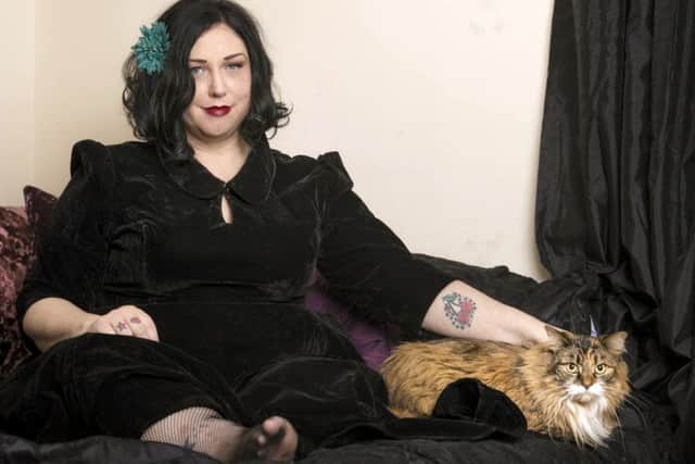 Anastasia-Camille Glover, with her cat Sadie EllenorePicture: Christopher Ison/PA Wire