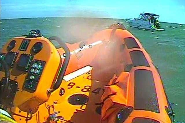 The RNLI lifeboat approaches the cruiser that came to the rescue Picture: RNLI/Brittany Jones