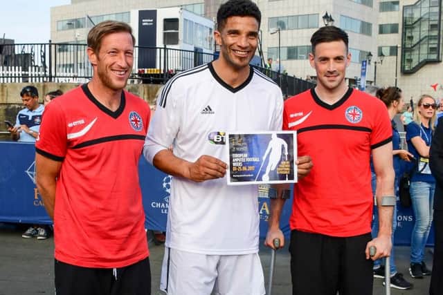 Spike Westbrook and Michael Masters meet former Pompey keeper David James, centre