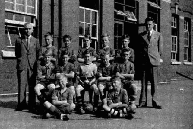 Alan Slade, back row, second from the left, with members of the Wimborne trophy-winning side.