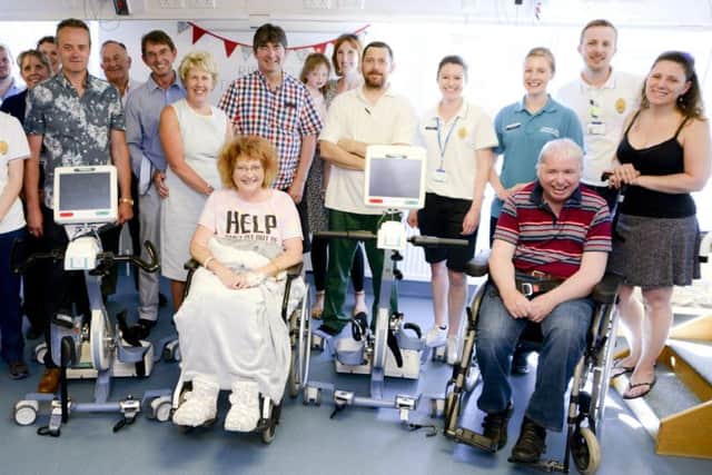 Staff and patients at the QA stroke centre with the brand new rehabilitation bikes 
							             Picture: Portsmouth Hospitals NHS Trust