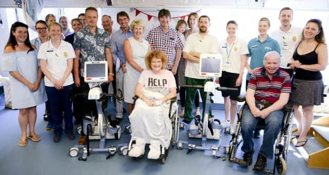 Staff and patients at the QA stroke centre with the brand new rehabilitation bikes 
							             Picture: Portsmouth Hospitals NHS Trust